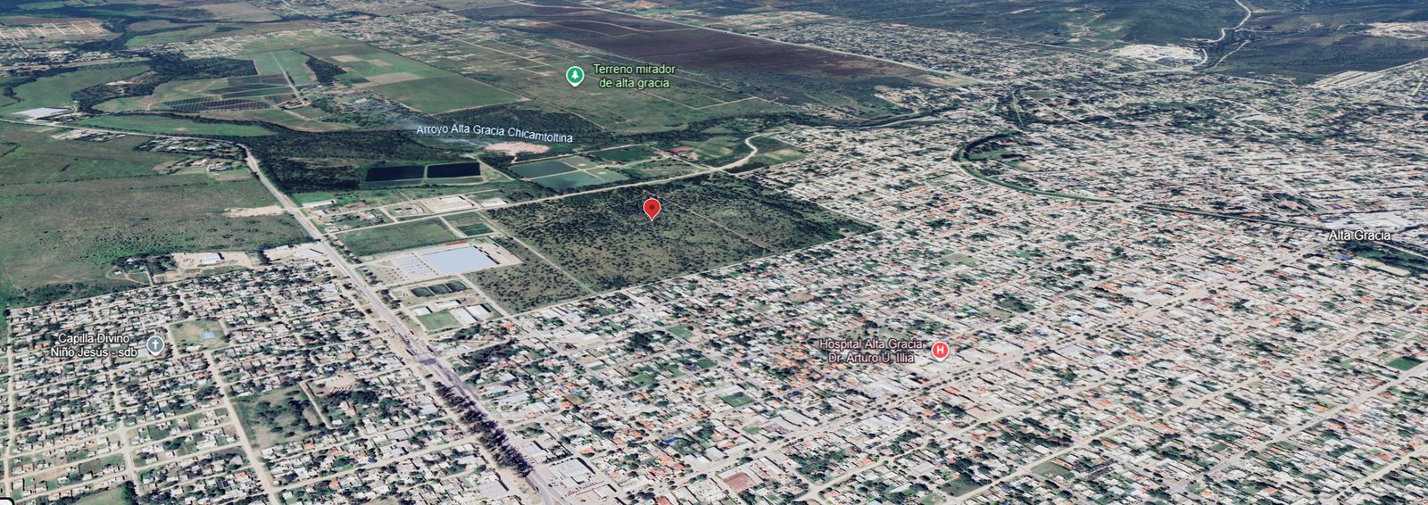 Vista aérea del terreno y barrios linderos